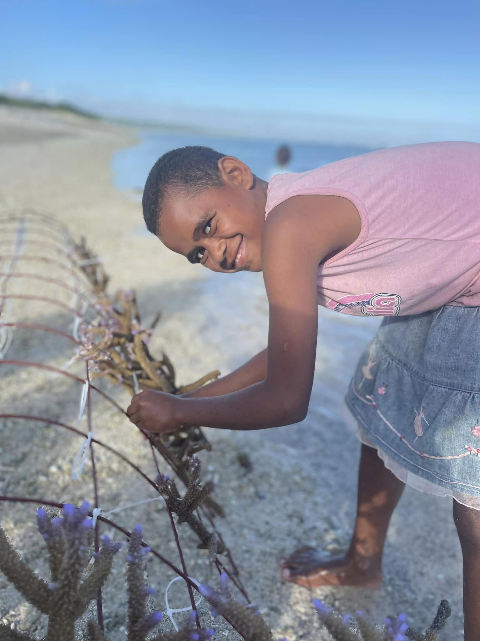 child coral planting