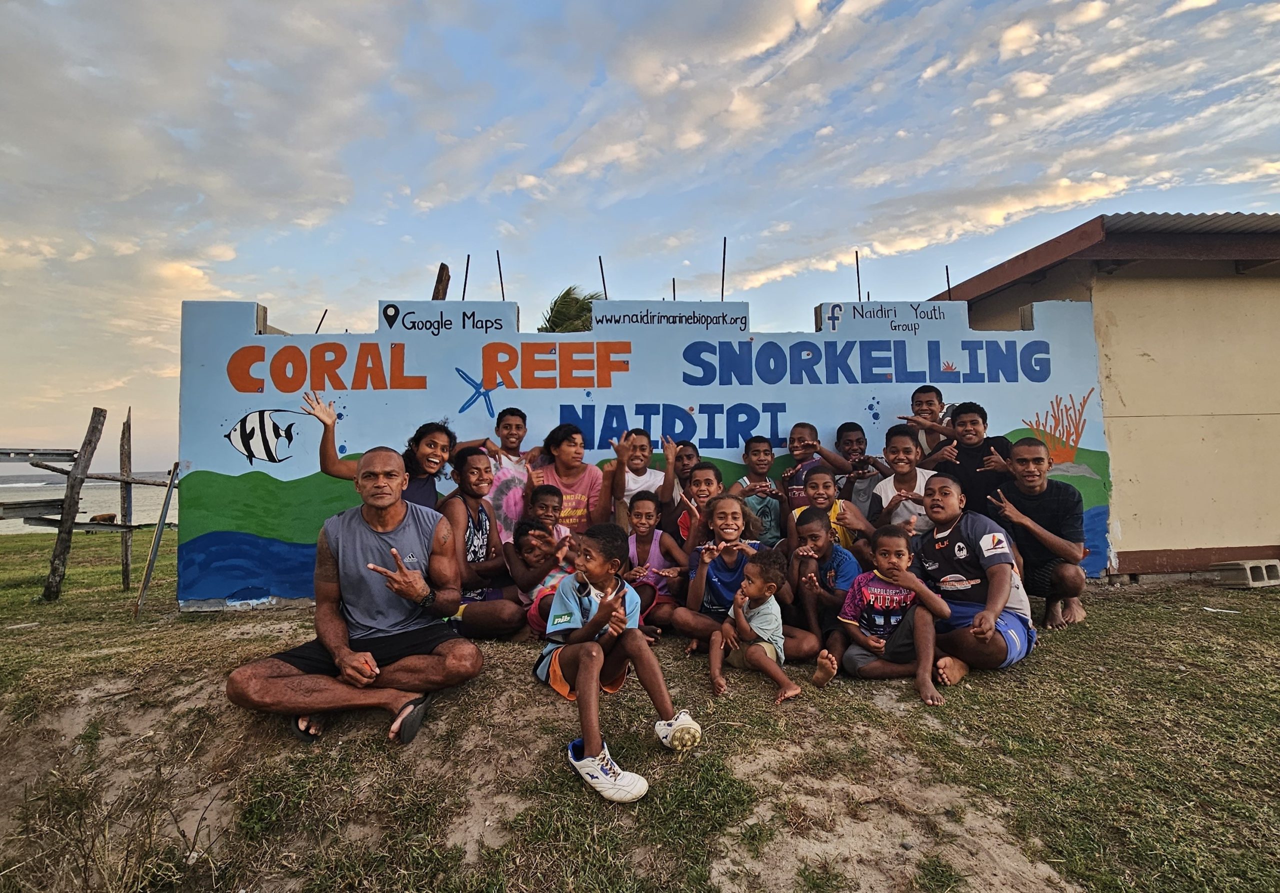 fiji children coral reef snorkelling